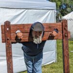 ren faire pillory stock evil corporations