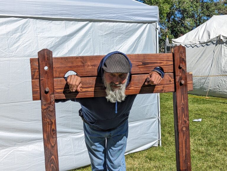 ren faire pillory stock evil corporations