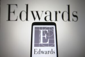 Edwards Lifesciences logo on phone and wall