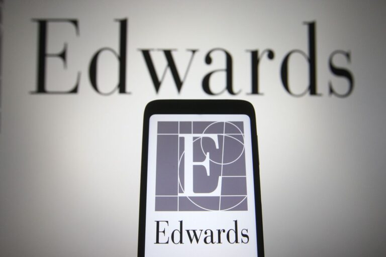 Edwards Lifesciences logo on phone and wall