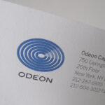 odeon capital group logo business card